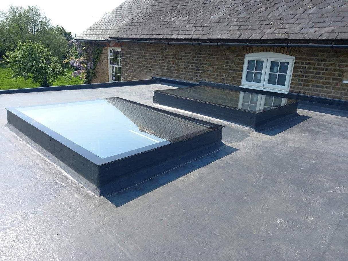 Flat roof installation with skylights