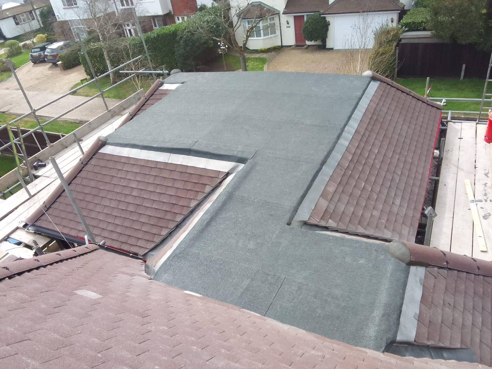Combined flat and tiled roof installation