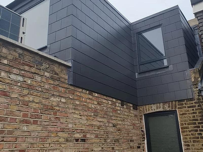 Modern zinc cladding on dormer extension